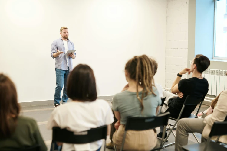 Presenter in front of a group of people