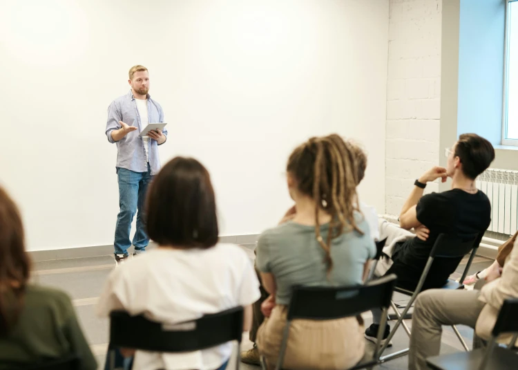Presenter in front of a group of people